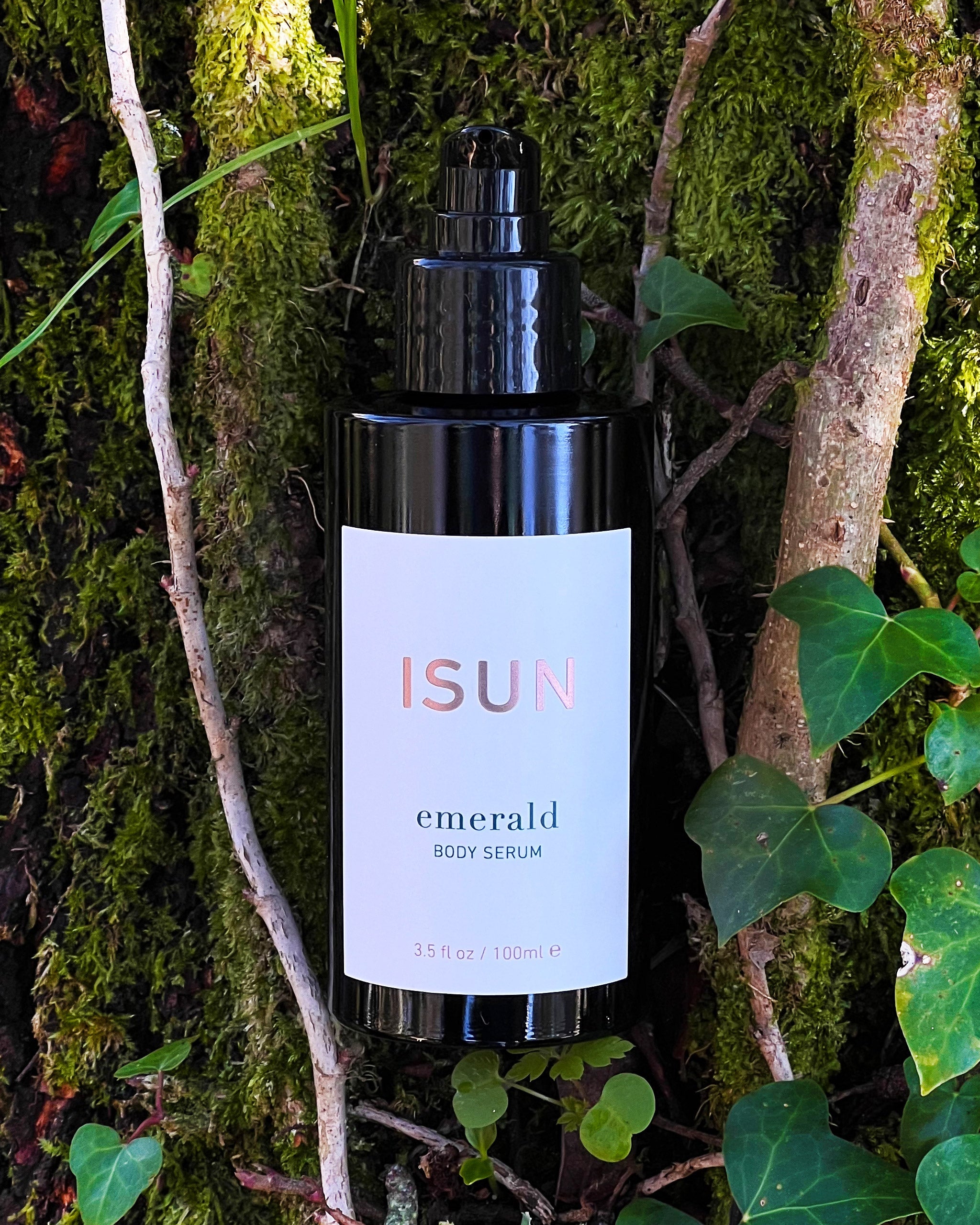 ISUN Emerald Body Serum 100ml amongst tree roots